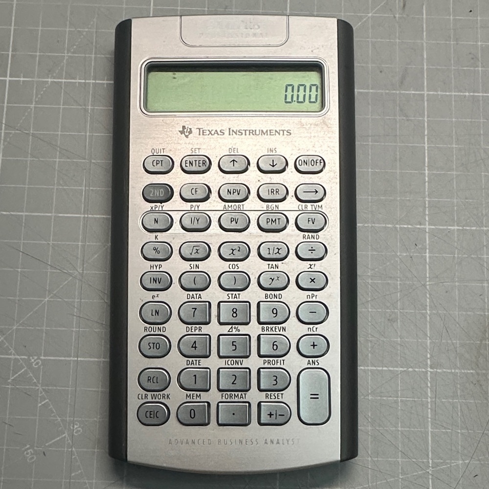 Texas Instruments Black and Silver Business Calculator